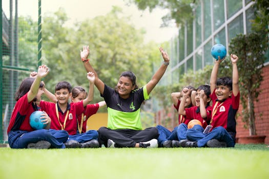 A joyful group of children with their teacher playing outdoors, fostering teamwork and happiness.